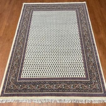 Indo Hand-knotted Mir Wool Rug (6'7 x 9'10)