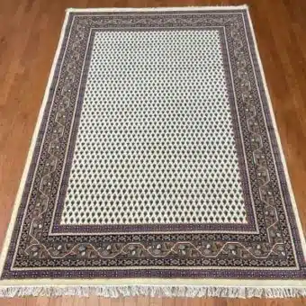 Indo Hand-knotted Mir Wool Rug (6'7 x 9'10)