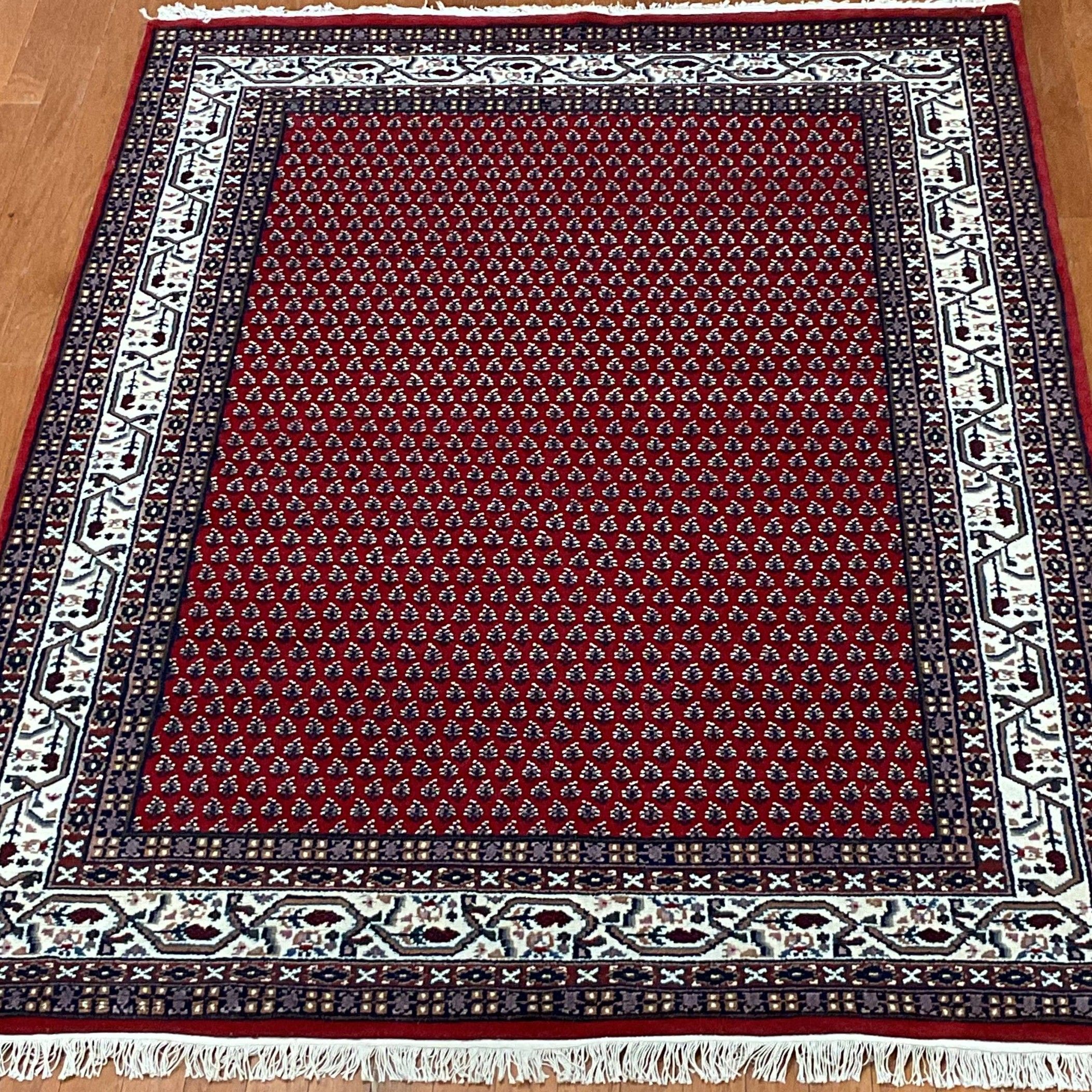 Indo Hand-knotted Mir Wool Rug (5'8 x 8'1)