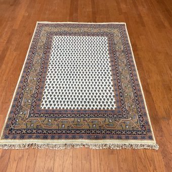 Indo Hand-knotted Mir Wool Rug (4'7 x 6'7)