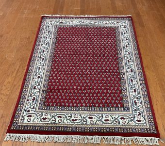 Indo Hand-knotted Mir Wool Rug (4'7 x 6'7)